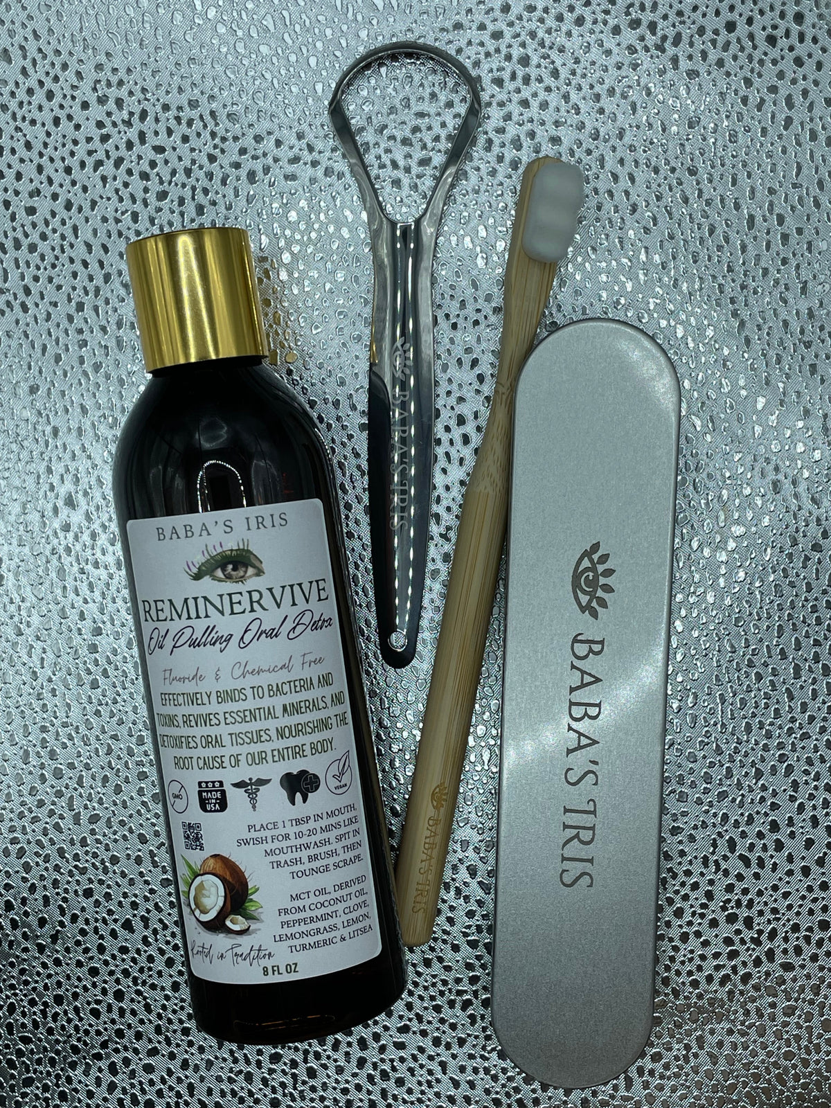 ReMinerVive oral wellness set with oil bottle, tongue scraper, toothbrush, and case